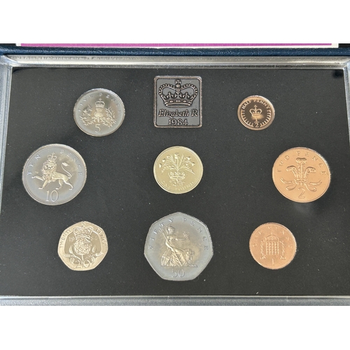 166 - Two Royal Mint boxed sets of 1984 proof coin collections