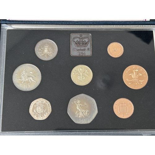 166 - Two Royal Mint boxed sets of 1984 proof coin collections