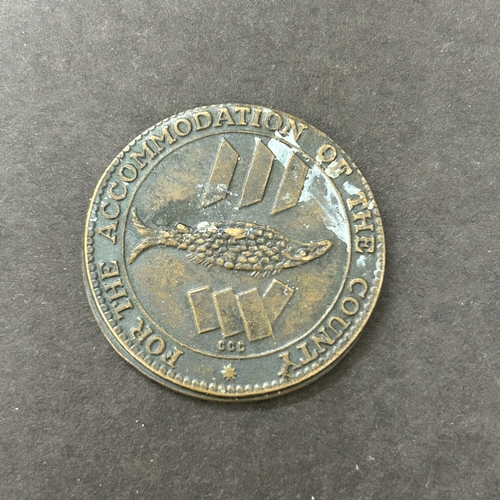 171 - Two small bags of George V copper pennies together with a bag of QEII, an 1811 Cornish token and a C... 