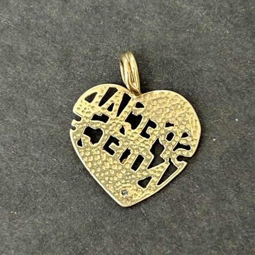 178 - A small yellow and white metal with diamond chip 'Special Niece' pendant, approx. 17mm long, weight ... 
