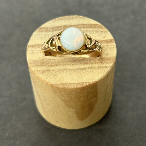179 - A 9ct gold ring with opal setting, approx. size P, weight approx. 1.9g