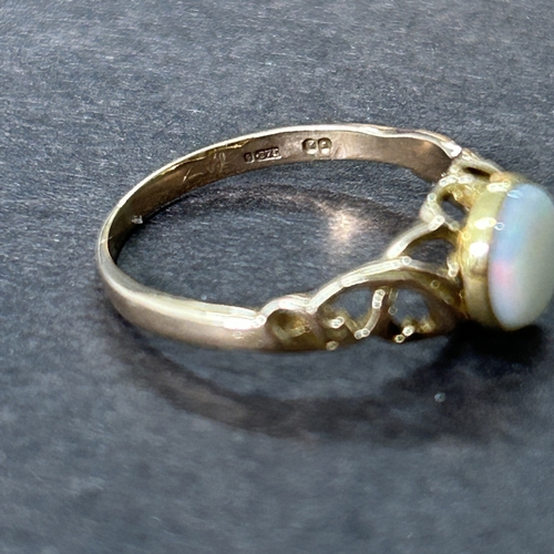 179 - A 9ct gold ring with opal setting, approx. size P, weight approx. 1.9g