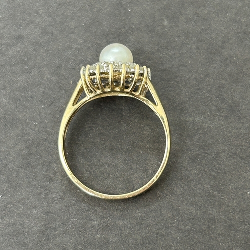 180 - A 9ct gold pearl and diamond chip ring, approx. size M, weight approx. 2.2g