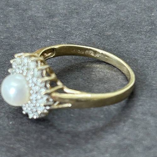 180 - A 9ct gold pearl and diamond chip ring, approx. size M, weight approx. 2.2g