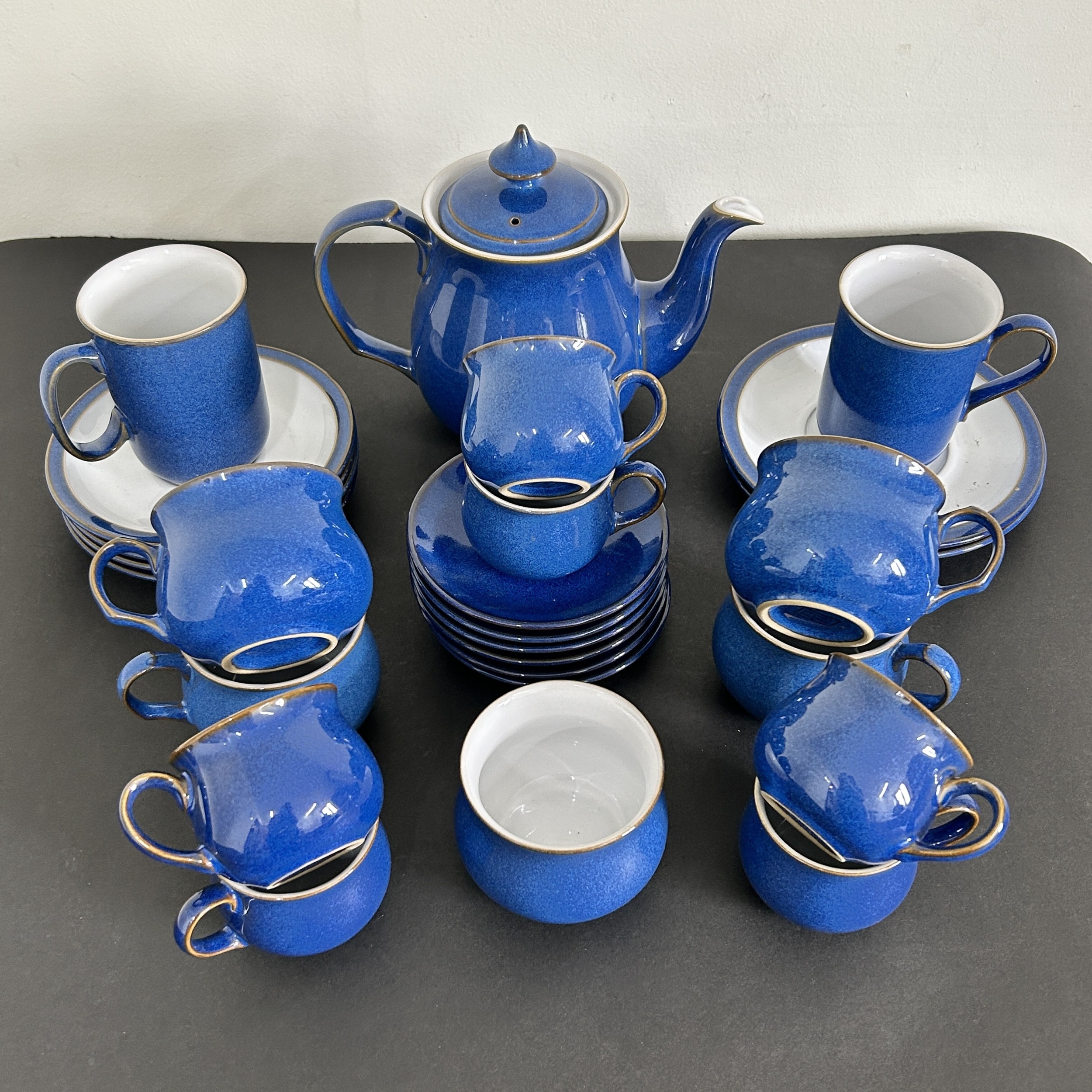 A part vintage Denby blue finish tea and coffee set in 4's and 6's to ...