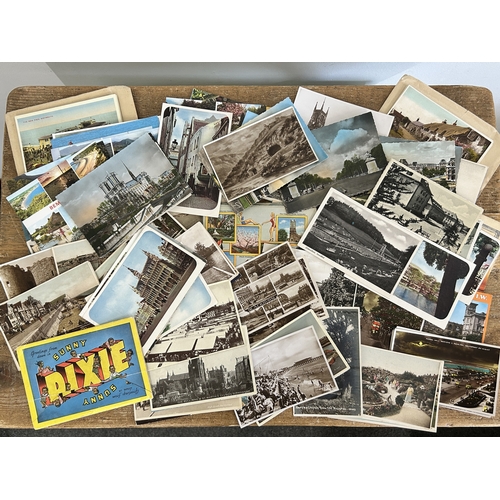 A collection of vintage mainly topographical postcards including a fold ...
