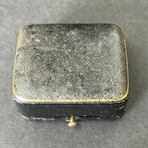 11 - An antique white metal frame containing a carved green stone horse head, approx. 1 1/2