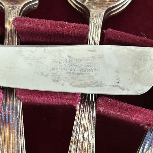44 - A wooden cased canteen of Elkington silver plated six setting cutlery plus six extra non-matching te... 
