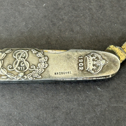 58 - A 1902 hallmarked silver Edward VII Coronation commemorative penknife with three blades, Sheffield 1... 