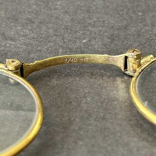 59 - 19th Century lorgnette spectacles, the cover inlaid with yellow and white metals (some losses and od... 