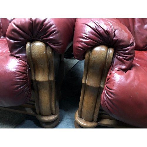 222A - Pair of comfy red arm chairs with removable covers. Solid wood frame