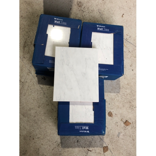9 - 3 full boxes of 20 and 4 lose Wickes wall tiles in Florina grey with marble effect (64)