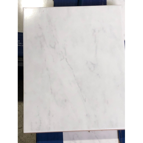 9 - 3 full boxes of 20 and 4 lose Wickes wall tiles in Florina grey with marble effect (64)