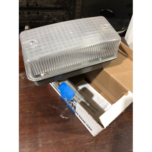 28 - Newlec bulkhead aluminium light.