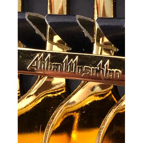 312 - Set of 12 interesting gold plated tea spoons.