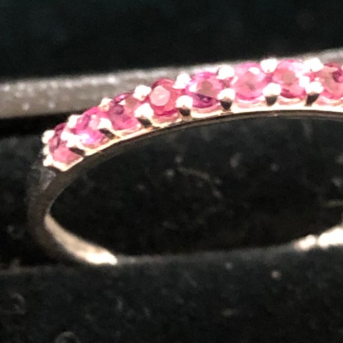 28 - 9ct White Gold Ruby 1/2 Eternity Ring. Size Q