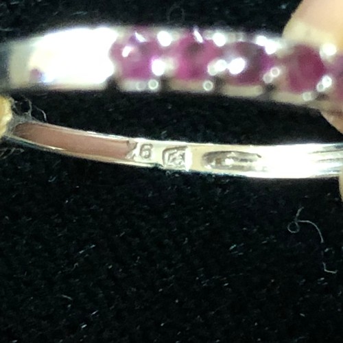 28 - 9ct White Gold Ruby 1/2 Eternity Ring. Size Q