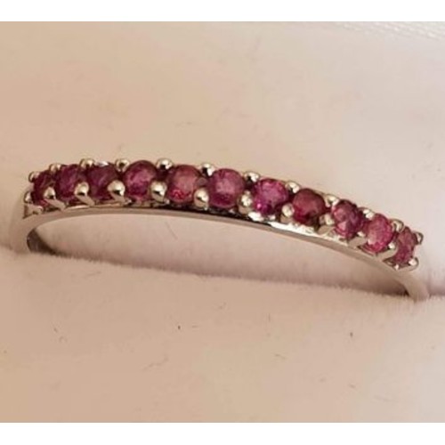 28 - 9ct White Gold Ruby 1/2 Eternity Ring. Size Q