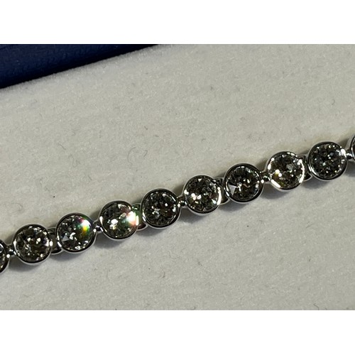 32 - Swarovski Crystal tennis bracelet with original box.
The tennis bracelet is a timeless classic and a... 