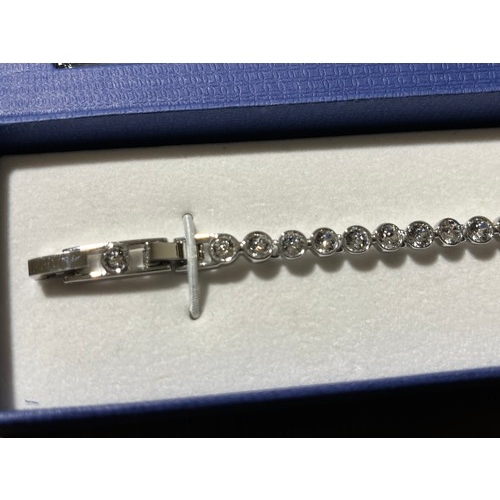 32 - Swarovski Crystal tennis bracelet with original box.
The tennis bracelet is a timeless classic and a... 