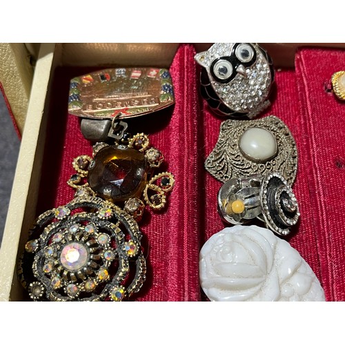 37 - Box of costume jewellery to include an owl and a watch