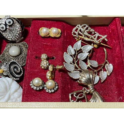 37 - Box of costume jewellery to include an owl and a watch