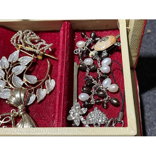 37 - Box of costume jewellery to include an owl and a watch