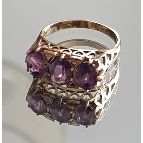 44 - 9ct Gold Amethyst Ring. Size N½ , 5mm x 7.25mm Stones