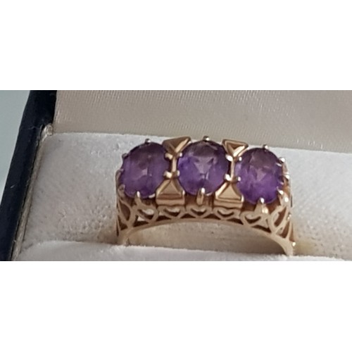 44 - 9ct Gold Amethyst Ring. Size N½ , 5mm x 7.25mm Stones