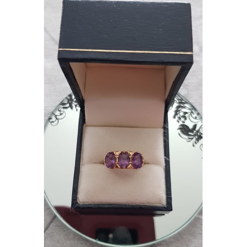 44 - 9ct Gold Amethyst Ring. Size N½ , 5mm x 7.25mm Stones