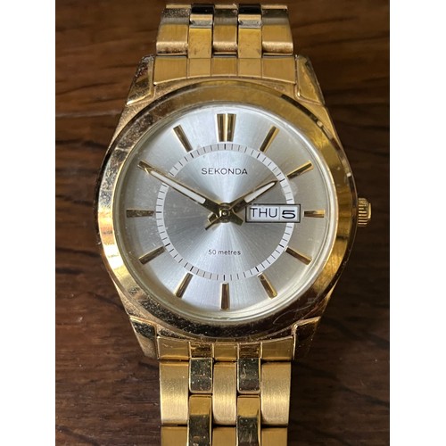 54 - Gents Sekonda Day Date watch with Metal strap 1980's in gold plated finish. Water resistant to 50 me... 