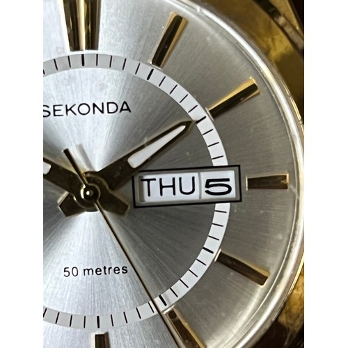 54 - Gents Sekonda Day Date watch with Metal strap 1980's in gold plated finish. Water resistant to 50 me... 