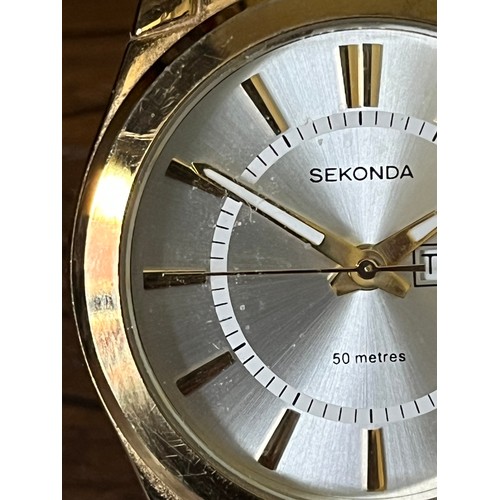 54 - Gents Sekonda Day Date watch with Metal strap 1980's in gold plated finish. Water resistant to 50 me... 