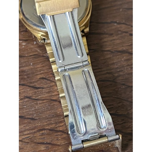 54 - Gents Sekonda Day Date watch with Metal strap 1980's in gold plated finish. Water resistant to 50 me... 