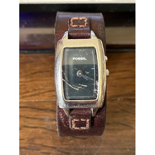 55 - Fossil watch with leather strap 1980's silver coloured finish