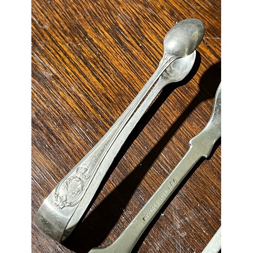 62 - Collection of American silver forks spoons and sugar tongs