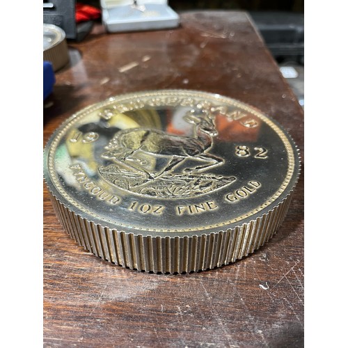 75 - Large Replica Kugerrand paperweight mimicking the 1oz Fine Gold coin that it represents, the replica... 