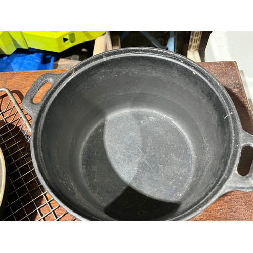 684 - Quantity of pans and grill for barbecue use. To include one heavy cast iron