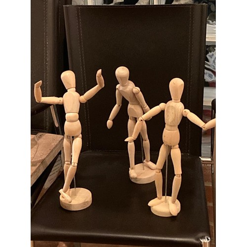 265 - Three jointed wooden figures