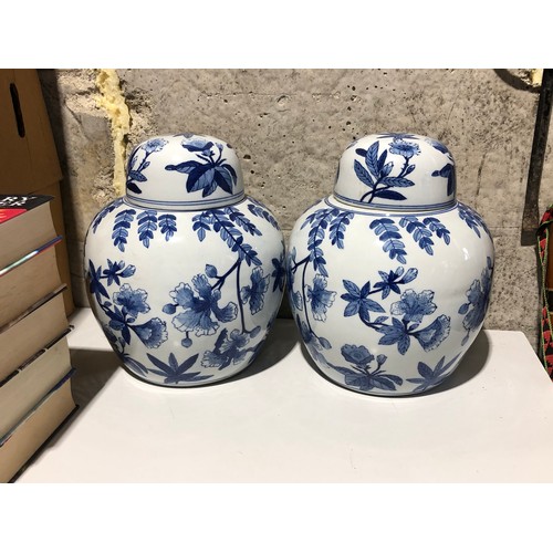 279 - Pair of large oriental lidded globular urns