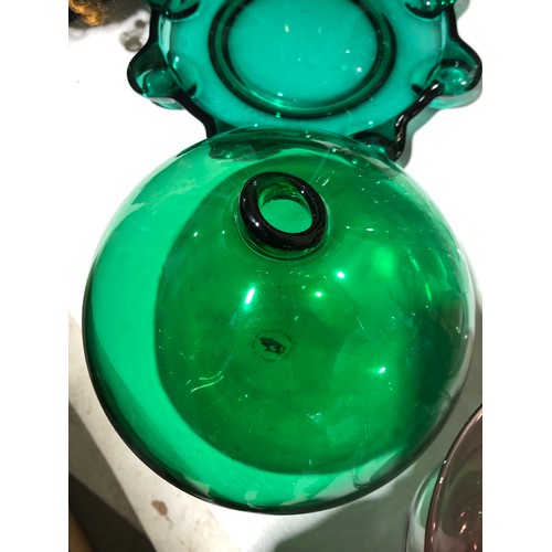 290 - Globular green glass bottle vase