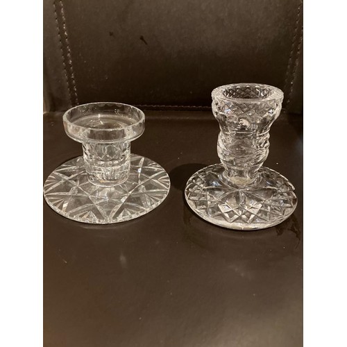 303 - Two cut crystal candlesticks