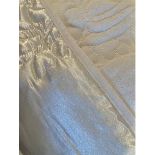 358 - Satin quilted bedspread in cream by Kelly Hoppen