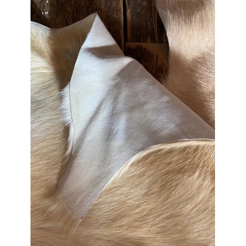 419 - Selection of Real fur Goat hides