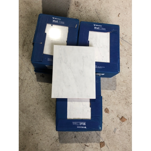 555 - 3 full boxes of 20 and 4 lose Wickes wall tiles in Florina grey with marble effect (64)