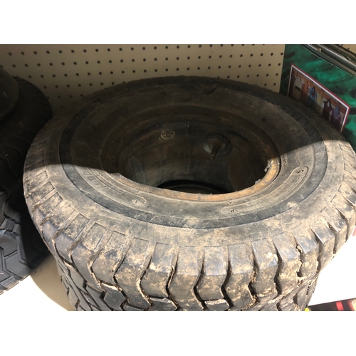 657 - Tyres and inner tubes for a ride on lawn mower as pictured.