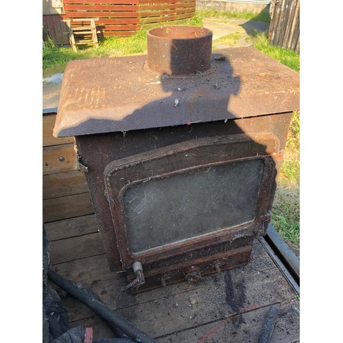 Multi fuel woodburner ( possibly by Woodwarm ) with flue and back ...