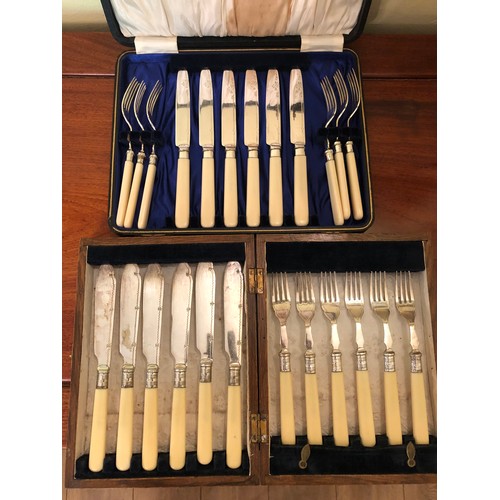 718 - 2 sets of fish knives