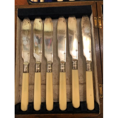 718 - 2 sets of fish knives