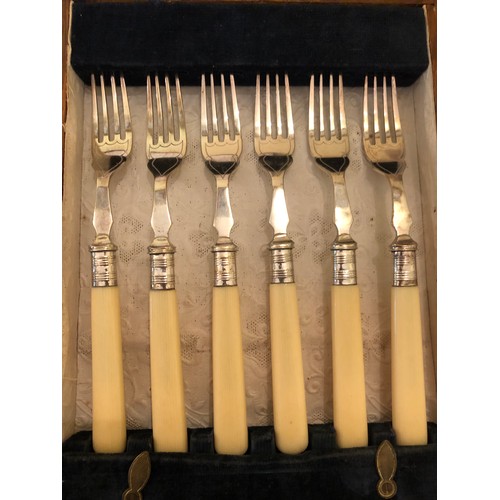 718 - 2 sets of fish knives